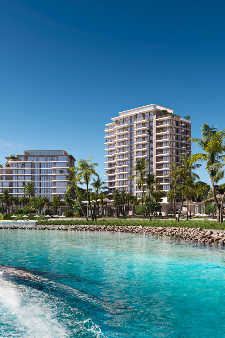 a man holding a woman on a beach